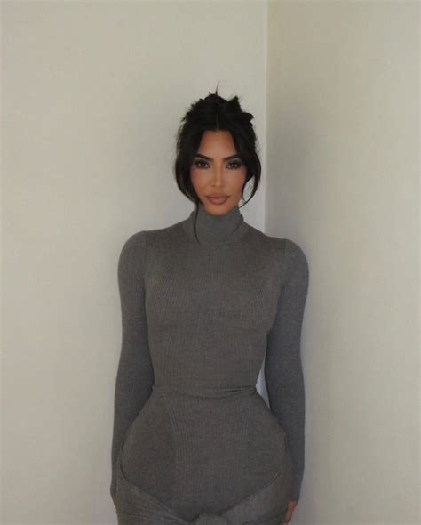 Kim Kardashian Wearing A Turtleneck Sweater Dress In August Proves That