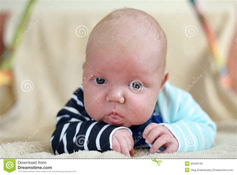 You may feel like you have no idea what you are doing. Newborn baby boy stock image. Image of cute, awake ...