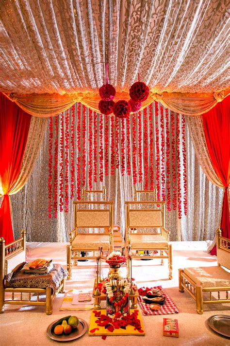 Indian Wedding Room Decoration An Ornate Red And Gold Traditional Indian Mandap The Art Of Images