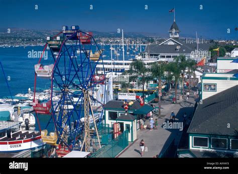 Ferris Wheel And Promenade On Waterfront At Balboa Island Funzone Stock