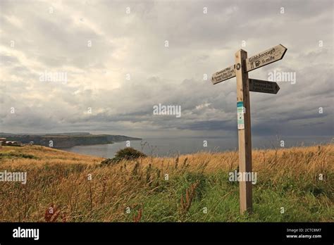 Wooden Cleveland Way Signpost Overlooking Runswick Bay Stock Photo Alamy