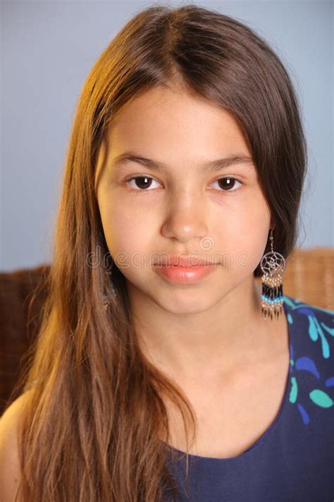 Dark Haired Brown Eyed Teenage Girl Posing In My Studio Stock Photo