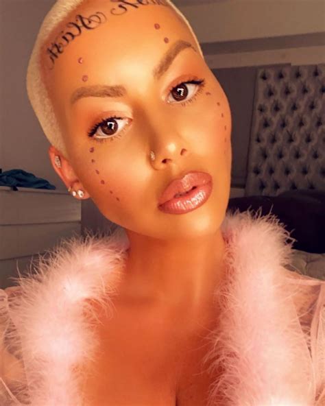 amber rose on her face tattoos ignoring haters usweekly
