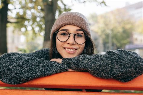 Close Up Outdoor Portrait Of Beautiful Young Brunette Woman Smiling
