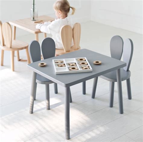 Shop our best selection of kids table & chairs to reflect your style and inspire their imagination. wood table and two kids chairs set by littlenomad ...