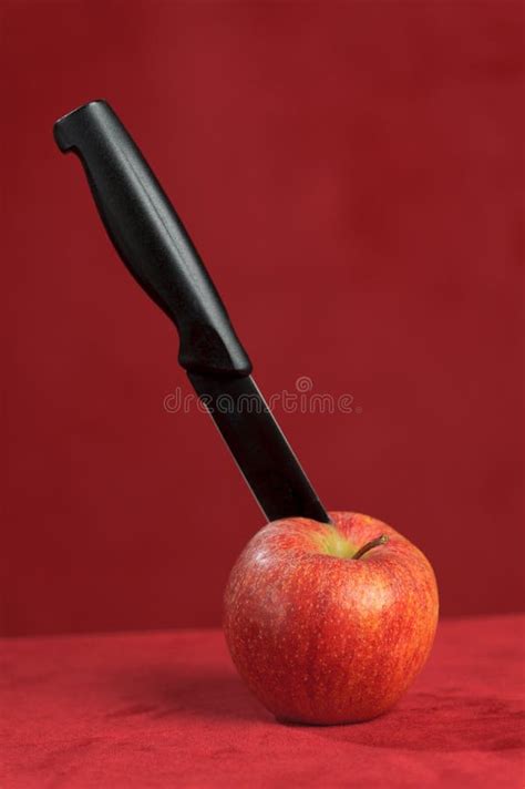 Apple With The Thrust Knife Stock Photo Image Of Nice Healthy 12873830