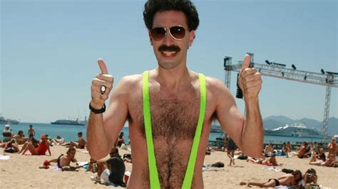Headband and wrist bands not included. Sacha Baron Cohen offers to pay tourists' 'Borat mankini' fine