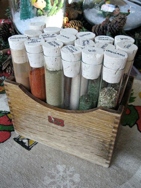 Four loose leaf tea blends in glass test tubes. DIY Test Tube Spice Rack - Dream Book Design