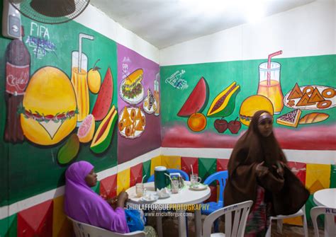 Eric Lafforgue Photography Somali Women Inside A Restaurant With Decorated Walls Woqooyi