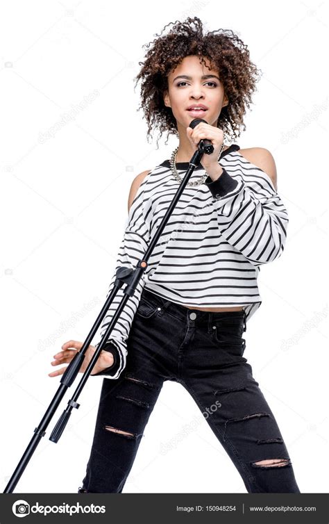Young Singer With Microphone — Stock Photo © Dmitrypoch 150948254