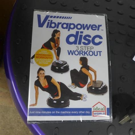 A Vibrapower Disc Wobble Board With Three Step Workout Disc