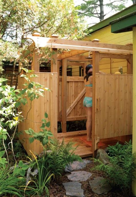 Create a garden shower using a watering can or a bucket with tiny holes drilled through the bottom. 10 DIY Outdoor Shower For Washing Yourself In The Fresh Air - Home and Gardening Ideas-Home ...