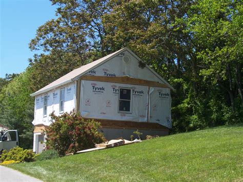 What i was thinking about was using some bottle jacks to raise the garage up enough to put in a row of concrete block on the slab, secure and seal it so no water gets in. Garage goes up! Raising the roof! - Dorman Home Remodeling