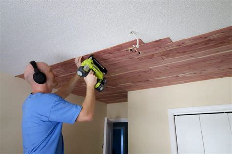 The cedar planks are soft enough that you can usually just hold the larger drill bit in your hand and drill begin the ceiling installation with the center planks. How to install a tongue & groove cedar plank ceiling