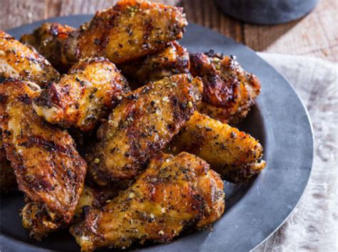 Remove the chicken from the buttermilk and drop into the dusk, coat the chicken in the dust. Easy Grilled Chicken Wings with Blue Cheese Dipping Sauce