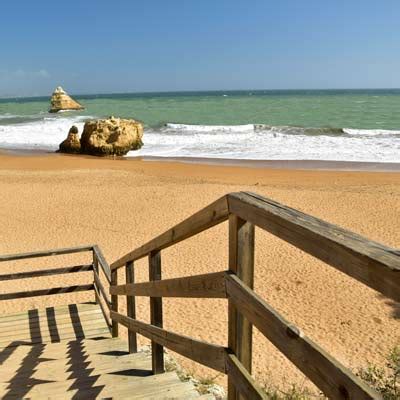 The sand is a perfect gold and the water emerald green, but the cliffs and rock formations. The Praia da Dona Ana Beach, Lagos