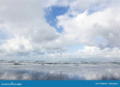 Clouds And Blue Sky Reflected In Wet Beach Stock Photo Image Of Beach