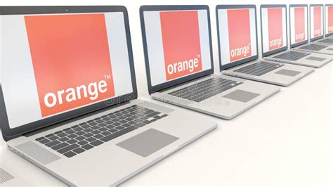 Modern Laptops With Orange Sa Logo Computer Technology Conceptual