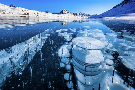 Ice Bubbles In Frozen Lago Bianco Digital Art By Lucie Debelkova Pixels