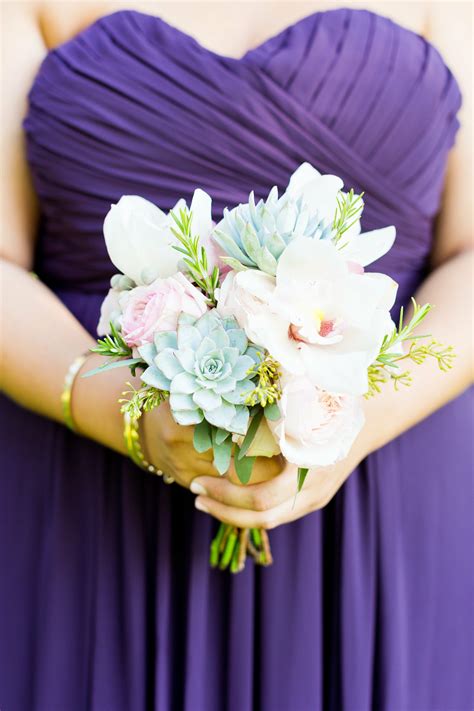 Sandra held a textural bouquet of white hydrangeas, phalaenopsis orchids, roses, ranunculus and succulents. Orchid and Succulent Bridesmaid Bouquet