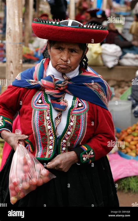 Quechua Woman Dressed In Traditional Round Hat On Indigenous Sunday