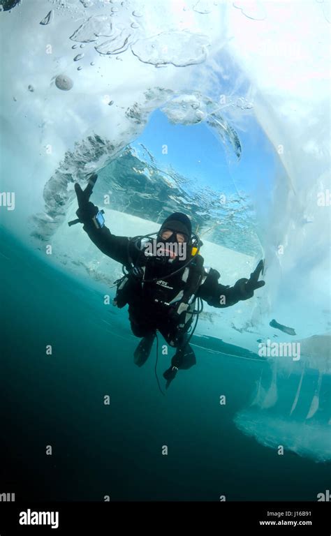 Siberia A Diver After He Jumped Into Lake Baikal An Ice Cubed Diver