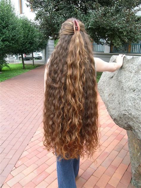Simply Gorgeous Her Wavy Hair Is Very Long And Thick Its Knee Length