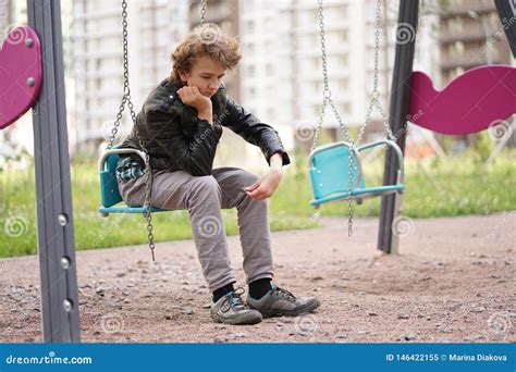 Sad Lonely Teenager Outdoor On The Playground The Difficulties Of Adolescence In Communication