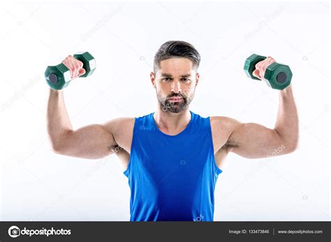 Man Exercising With Dumbbells — Stock Photo © Andrewlobov 133473846