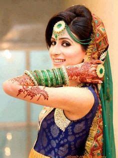 Loose and big curls at the end balance the straight top in a luscious manner. Hairstyles For Mehndi Party Function » Fashion Tips
