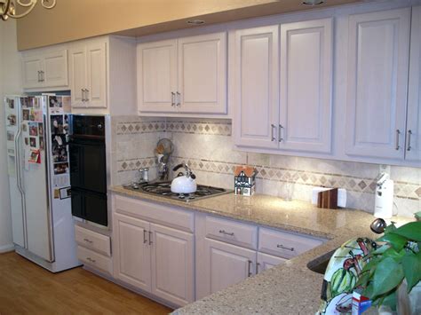 Get quotes & book instantly. Newly refaced white kitchen cabinets to brighten up the ...