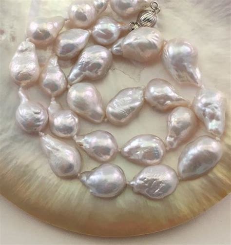 Real Or Fake How To Tell If Your Pearls Are Genuine Pure Pearls Vlr