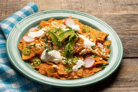 Red Chilaquiles With Cheese And Avocado Mexican Food Stock Image