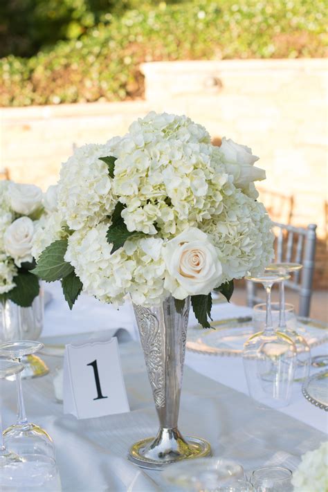 white hydrangea and rose centerpieces