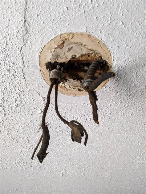 Learn how to inspect old lights, secure a terminal, and wire new lights. How can I put a proper ceiling light outlet box in this ...