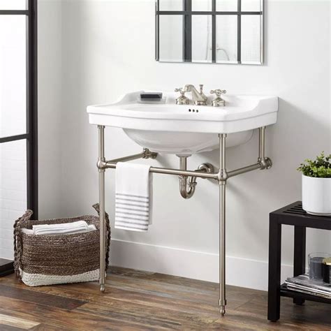 Contemporary Embellishments Enhance The Cierra Console Sink With Brass