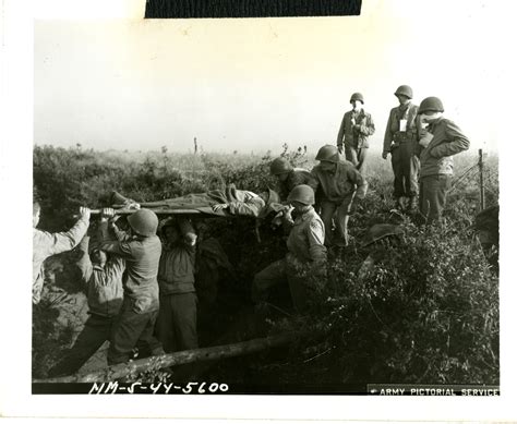 Wounded Us Soldier Being Carried On Litter In Cisterna Italy On 26 May