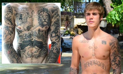 Justin Bieber Flaunts Heavily Tattooed Chest As He Reveals Hes Spent Over 100 Hours Getting
