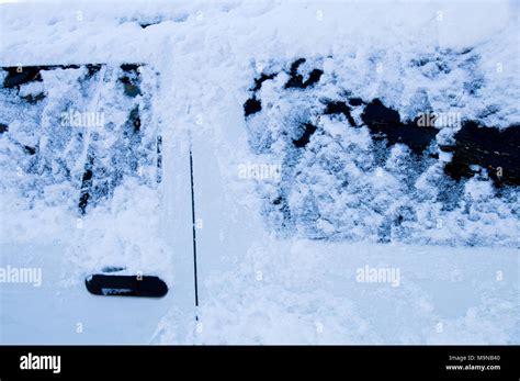 Snow Covering Car Windows Stock Photo Alamy