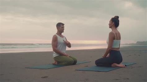 People Practicing Breathing Techniques On Beach Stock Footage Videohive