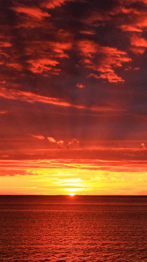 Sunrise (countable and uncountable, plural sunrises). Download wallpaper 938x1668 horizon, sunrise, sea, sun ...
