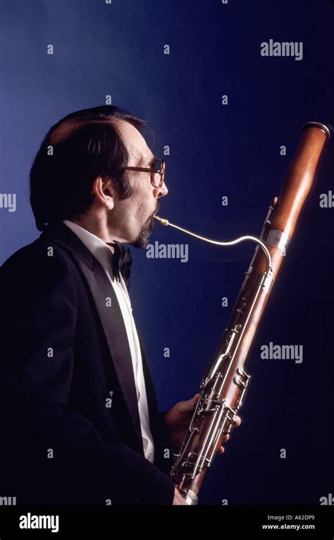 A Studio Portrait Of A Musician Playing A Oboe Instrument Stock Photo