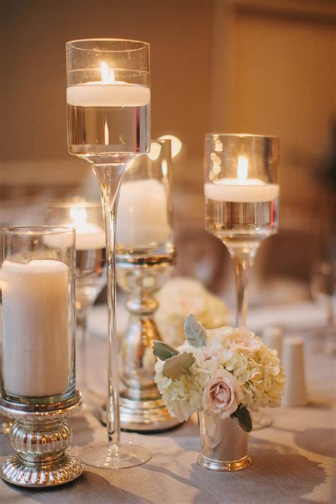 Selecting the below showcased wedding candle centerpieces will assure you a passionate ambiance at your wedding as candles have a romantic. Tips on how to use suspended candles? Remarkable ideas for ...