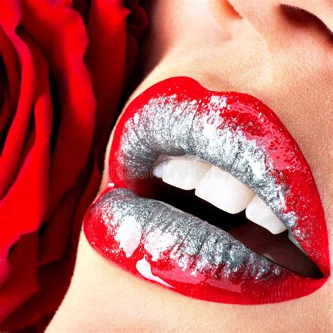 Beautiful Female Lips With Shiny Lipstick And Red Rose Royalty Free