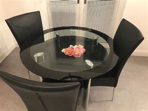 Harveys Black Glass Round Dining Table With 4 Chairs In Audenshaw