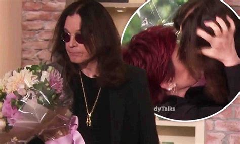 Ozzy And Sharon Osbourne Share A Passionate Kiss As He