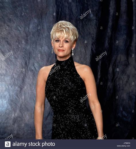 Daughter of country crooner george morgan, she established herself as a major star in the early 1990s. Photos & Lorrie Morgan Stock Images ... | Lorrie morgan, Cma music festival, Country music festival