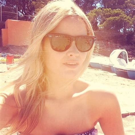 Laura Whitmore Shows Off Washboard Stomach In White Bikini In Ibiza