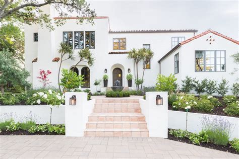 A Spanish Revival Homes Neglected Exterior Gets A Modern Makeover