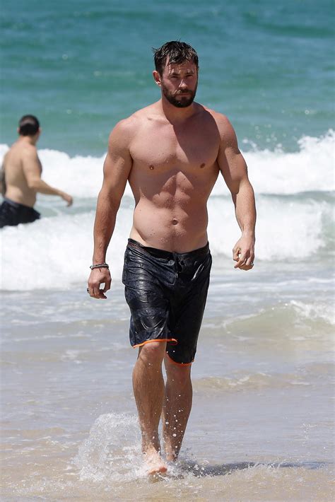 chris hemsworth went shirtless on the beach australia photos